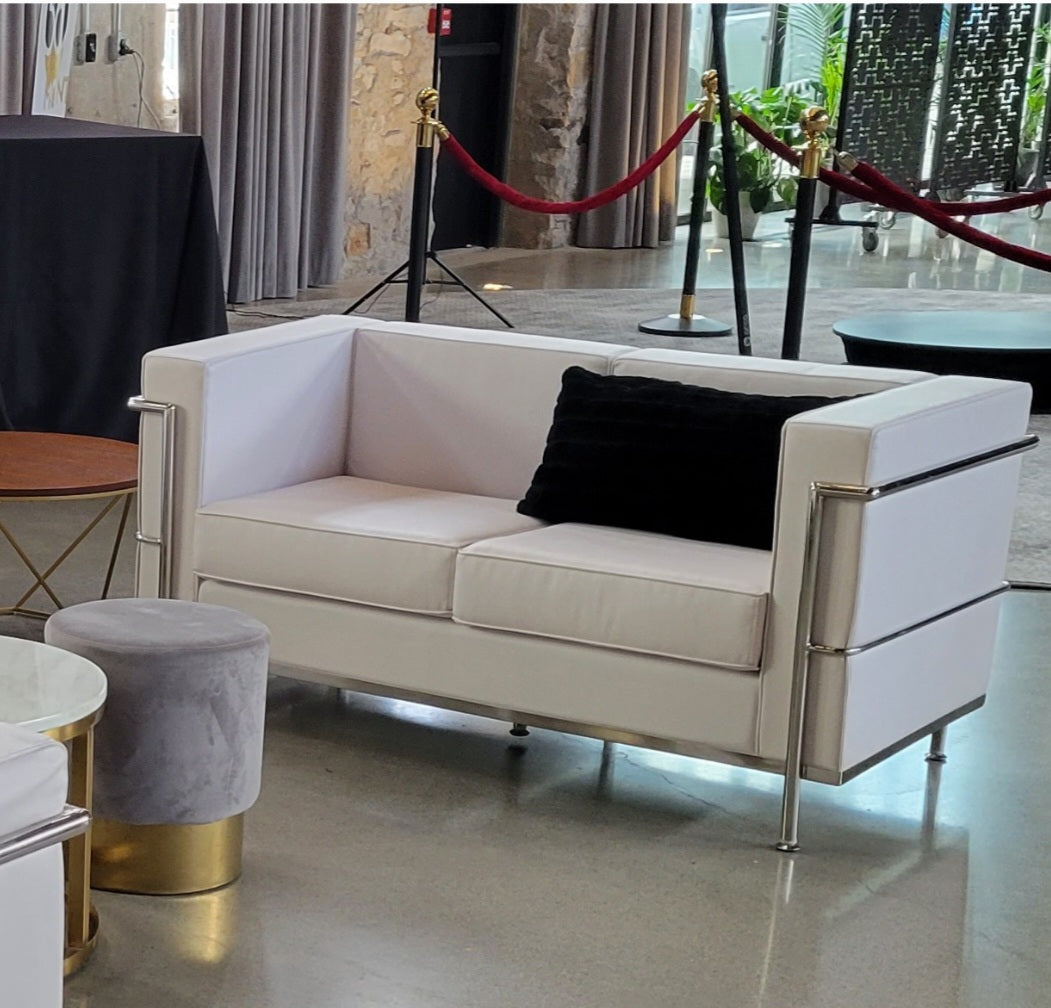 white 2 seater sofa with silver